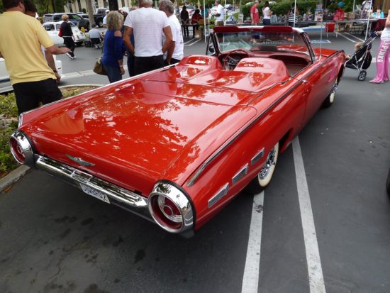 1962 Ford Thunderbird with the rare rear seat covers. Watching the top go up and down is a blast!