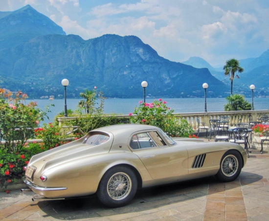 Ingrid Bergman's 1954 Ferrari 375 MM Berlinetta Coupé Special Pinin Farina parked outside the Grand Hotel Villa Serbelloni in Lake Como, Italy.